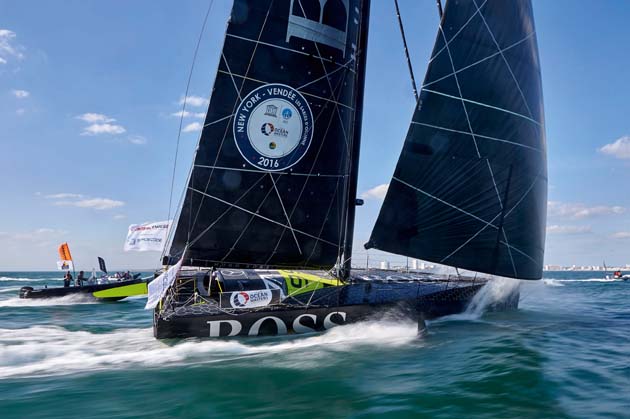 Hugo Boss finishes third in Les Sables d'Olonne at the end of the 3100-mile New York-Vendee single-handed transatlantic race. credit Thierry Martinez